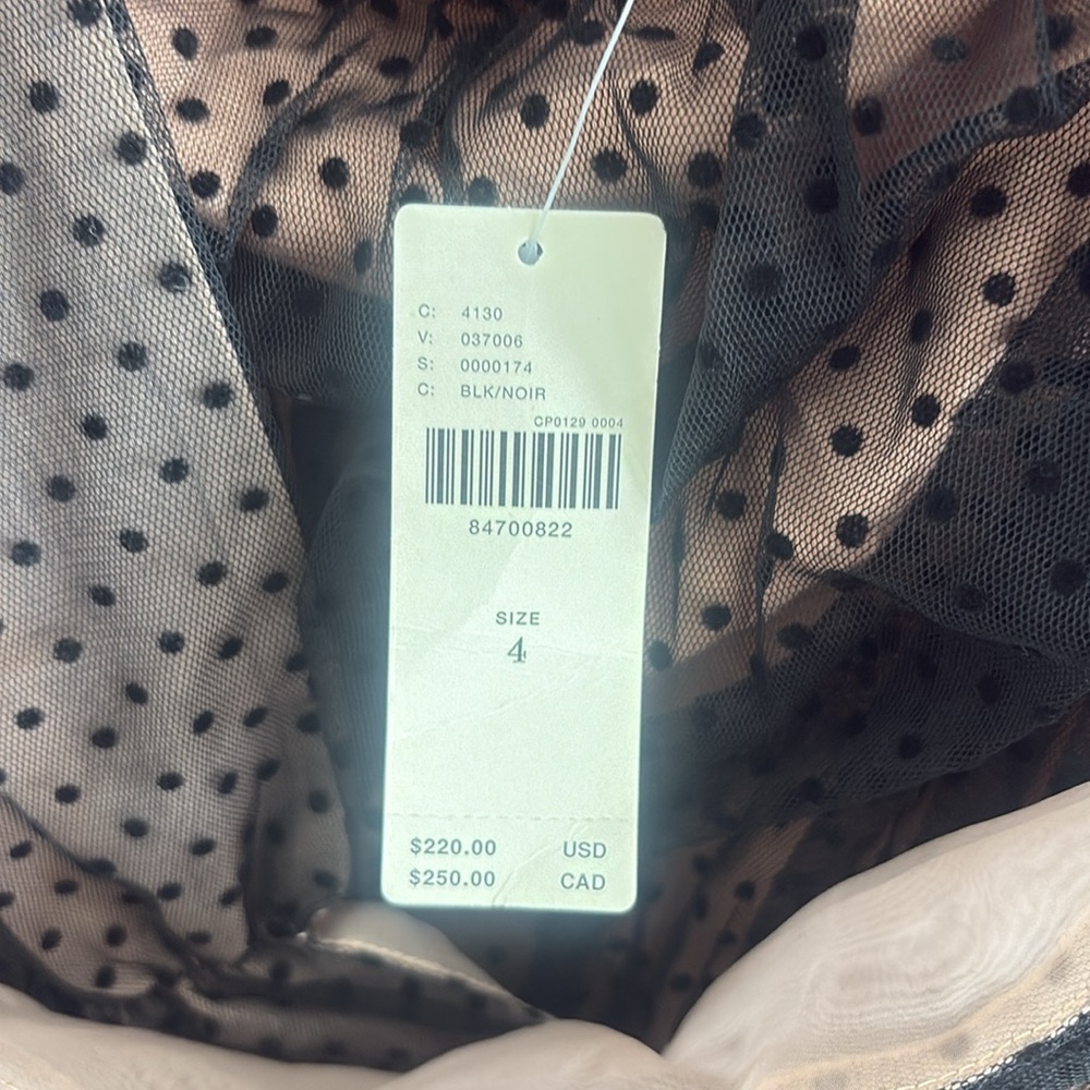 Anthropologie Black and Tan Polka Dot Dress
never worn. Runs big can fit size 6. - Picture 3 of 8